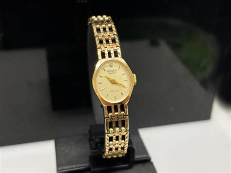 pre owned ladies gold watches.